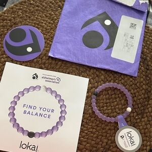 Alzheimer’s Lokai purple bracelet new but tag is torn with Lokai sticker